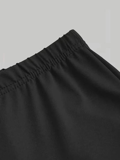 Girls' Midnight Star K-Pop 2-Piece Set: Black Graphic Tee & Flared Bell-Bottom Pants