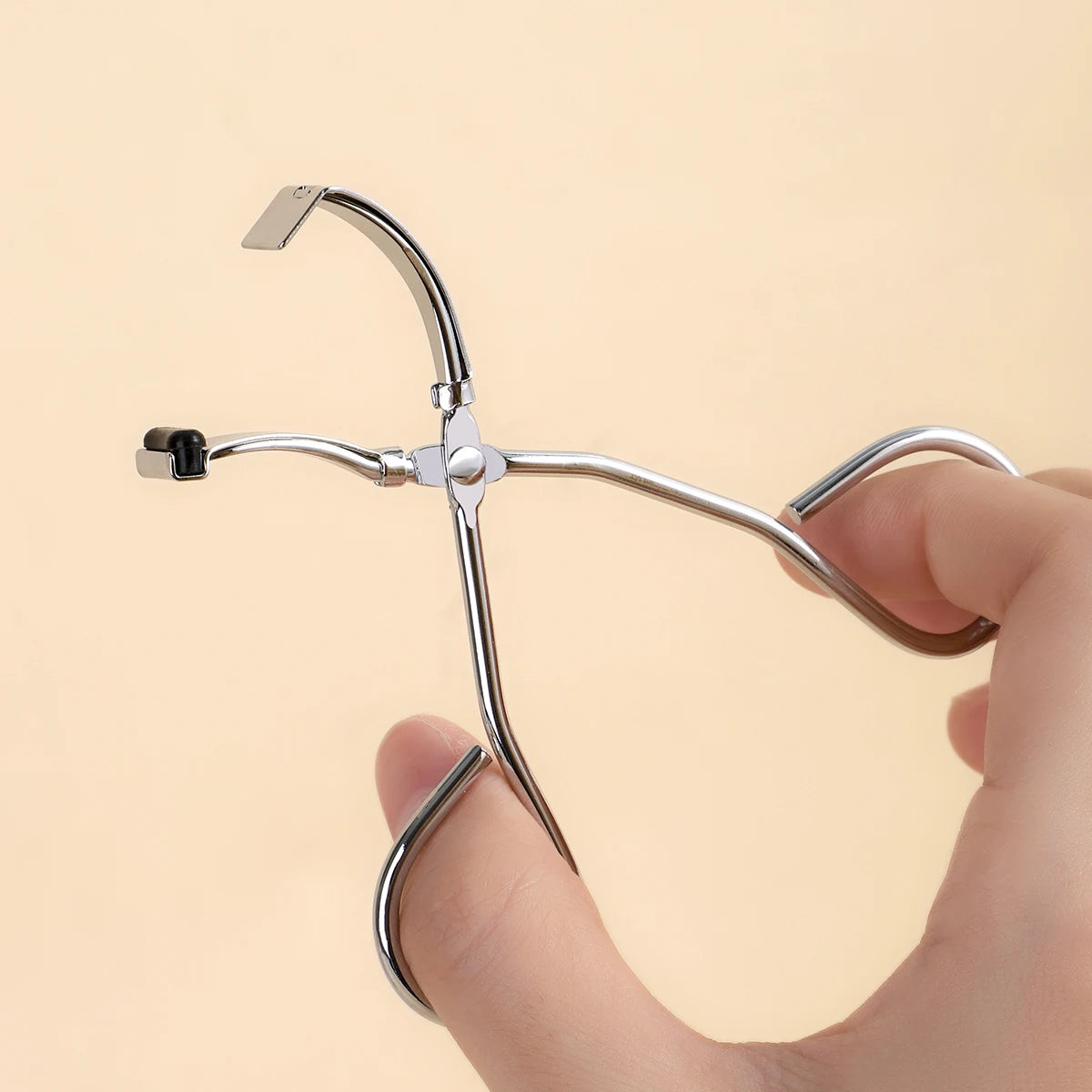 Stainless Steel Eyelash Curler.