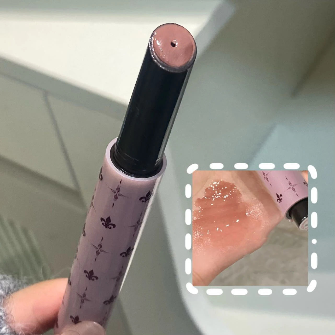 Purple Shimmer Lip Gloss.