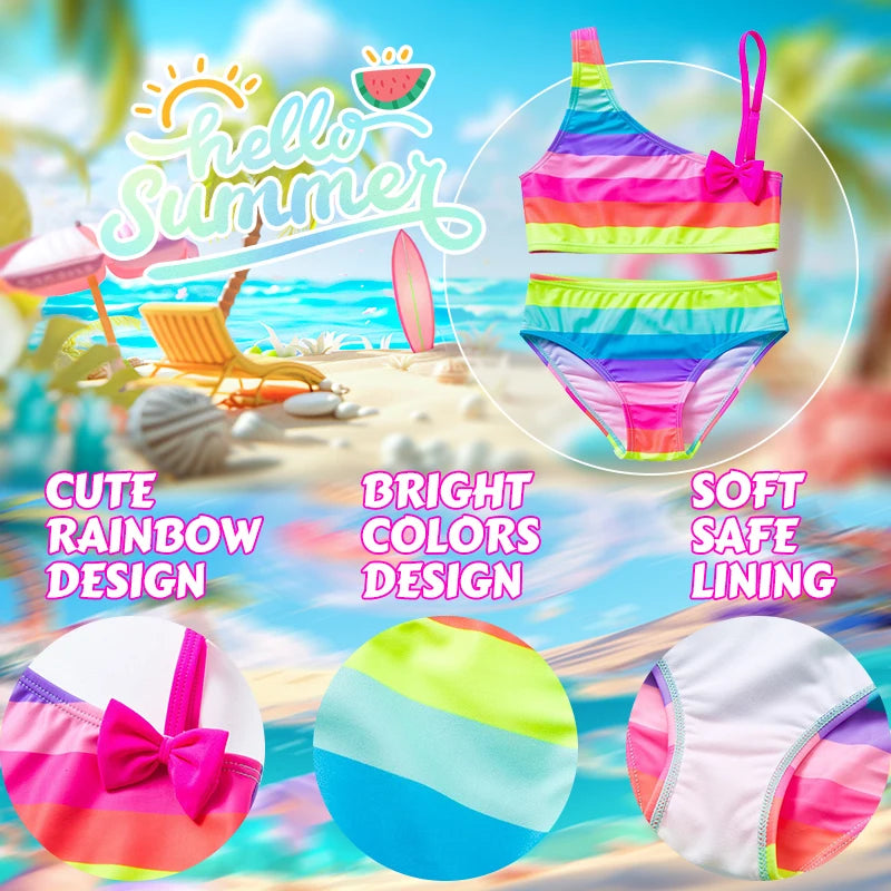 Two-piece rainbow striped girl's swimsuit featuring a golden crown 'Queen' graphic and a pink decorative bow.