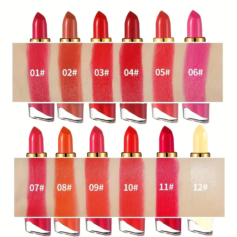 Arm swatches showing 12 different shades of Beyond Beauty Creamy Moisturizing Lipstick including reds, oranges, and pinks.
