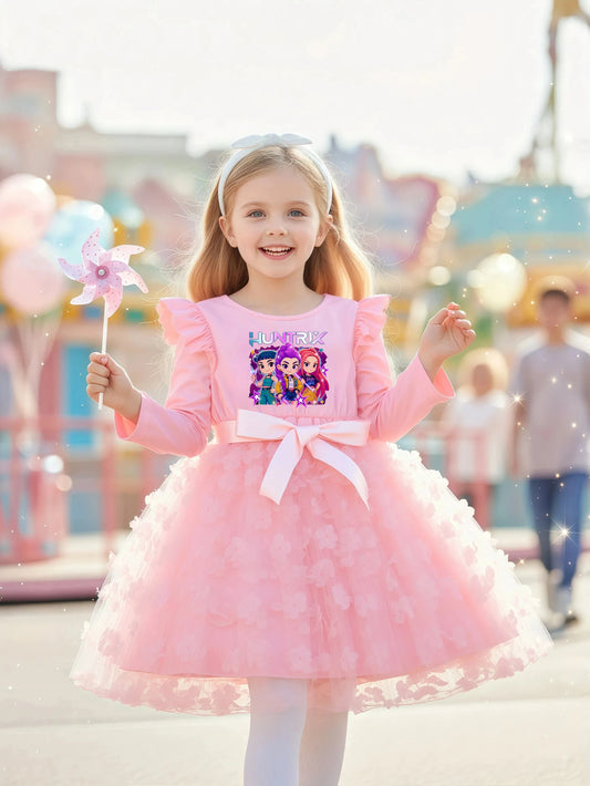Young girl in a pink long-sleeve K-Pop HUNTRX dress with 3D butterfly appliques on a tulle skirt.