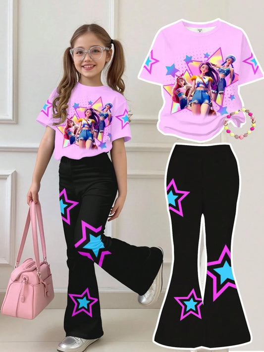 Young girl wearing a pink K-Pop idol graphic t-shirt and matching black flare pants with star prints.