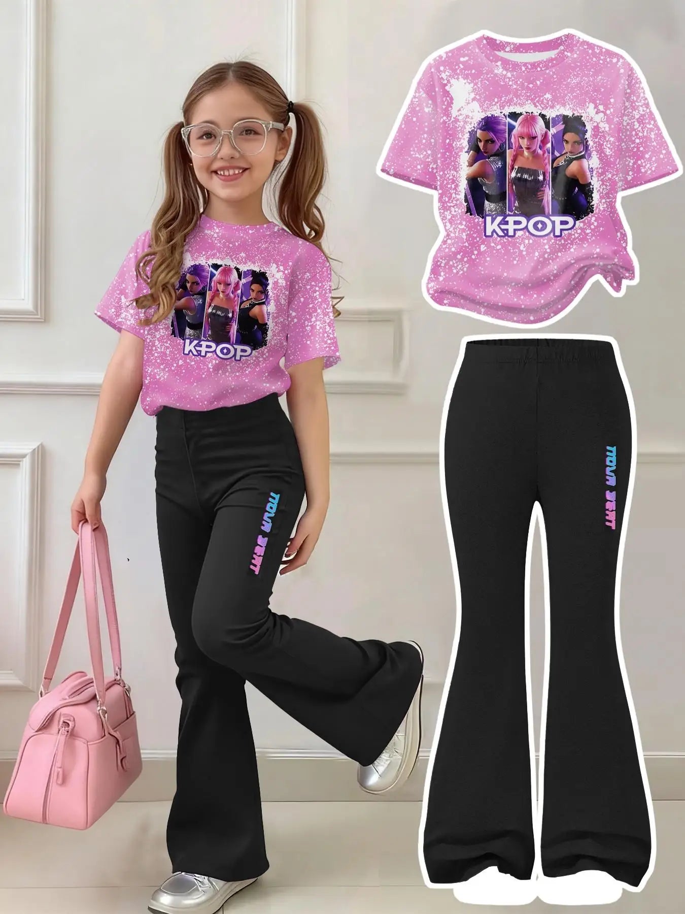Young girl wearing a K-Pop pink splatter print t-shirt and matching black flared pants with 'Nova Beat' logo.