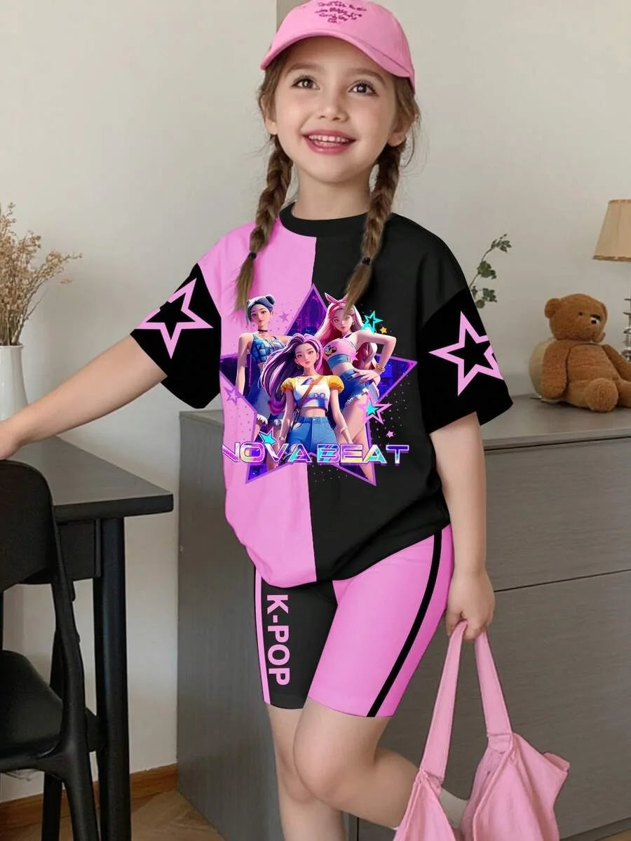 Girl wearing a split pink and black K-Pop Nova Beat graphic t-shirt and matching biker shorts.
