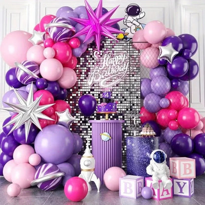 Professional balloon arch setup using the purple and hot pink celestial kit for a galaxy-themed birthday party.