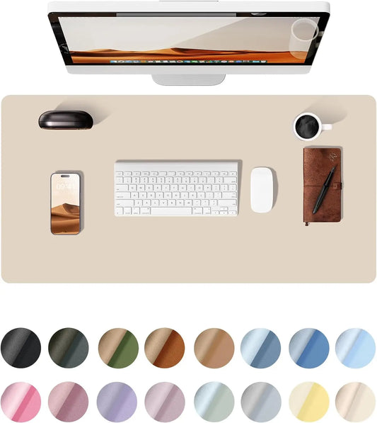 Top view of a clean office setup with a YSAGi desk mat and a showcase of available colors including black, pink, and blue.