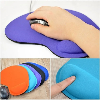 Close-up of a blue EVA mouse pad showing the soft sponge wrist guard for pressure relief.