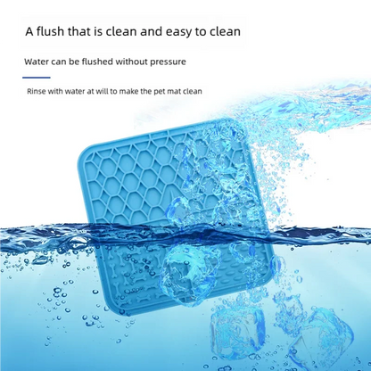 Blue silicone pet licking mat being rinsed under water to show how easy it is to clean.