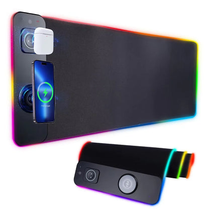 XXL RGB luminous desk mat with integrated magnetic wireless charging for smartphone and accessories.