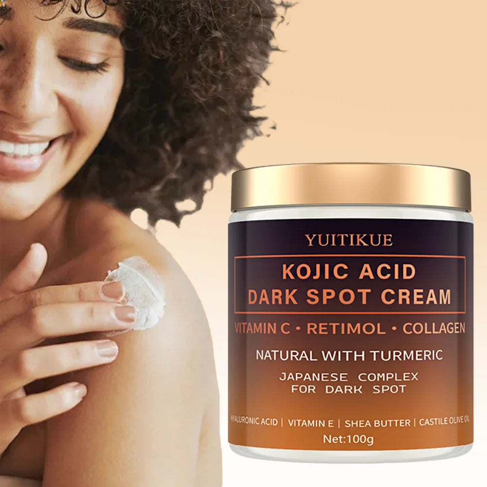 Front view of YUITIKUE Kojic Acid Dark Spot Cream jar with Vitamin C, Retinol, and Collagen on a lifestyle background.