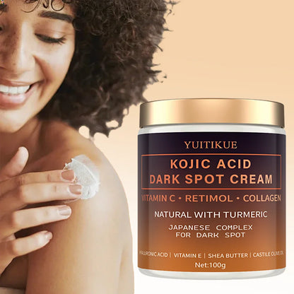 Front view of YUITIKUE Kojic Acid Dark Spot Cream jar with Vitamin C, Retinol, and Collagen on a lifestyle background.