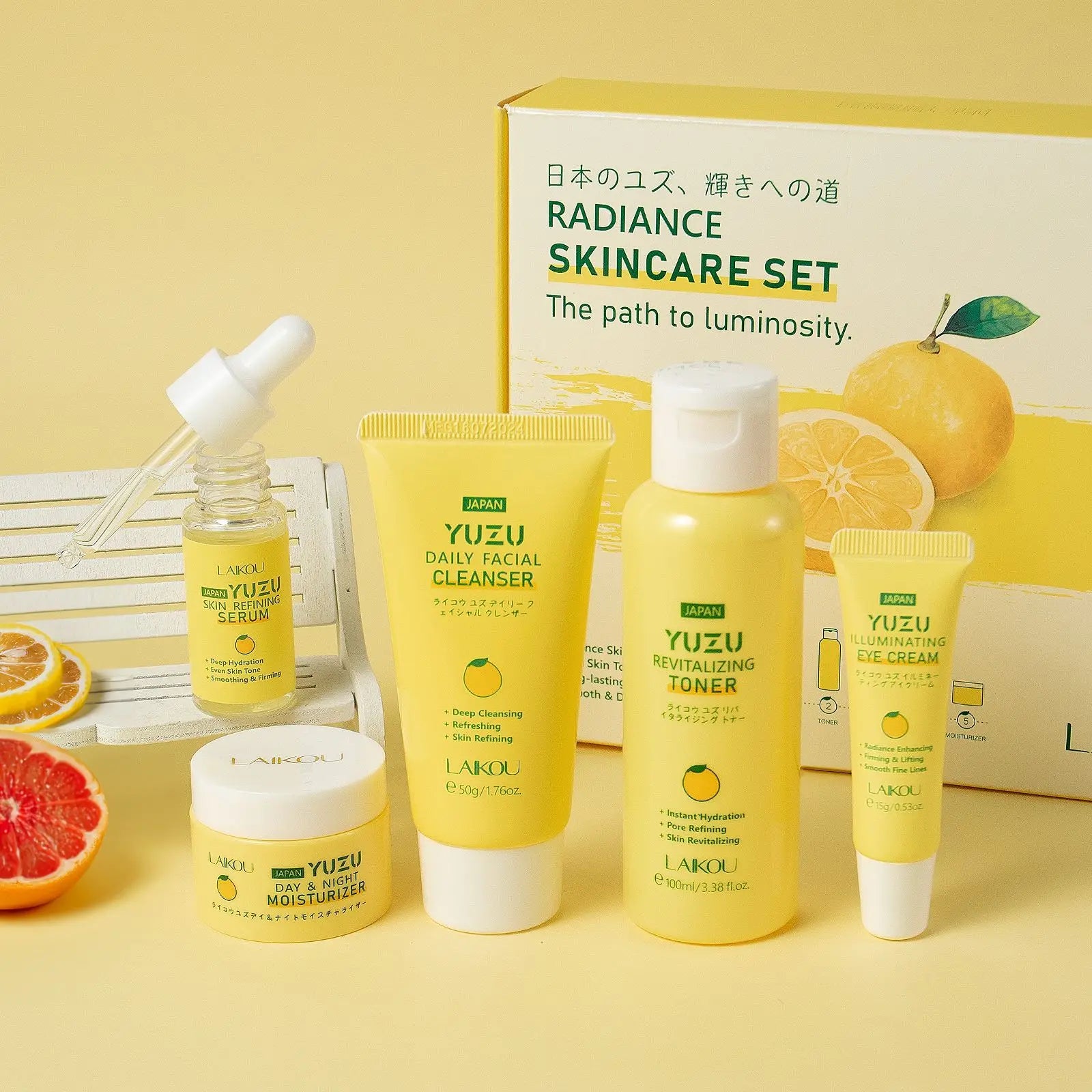 Top view of the Yuzu Vitamin C skin care gift box showing the complete 5-piece rejuvenating routine.